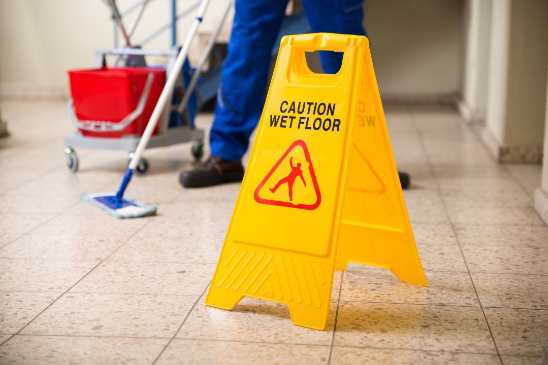 Low,Section,Of,Worker,Mopping,Floor,With,Wet,Floor,Caution